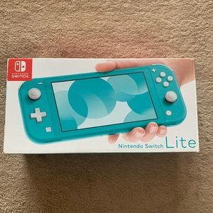 Used Nintendo switch Lite blue w Mario 3D All stars